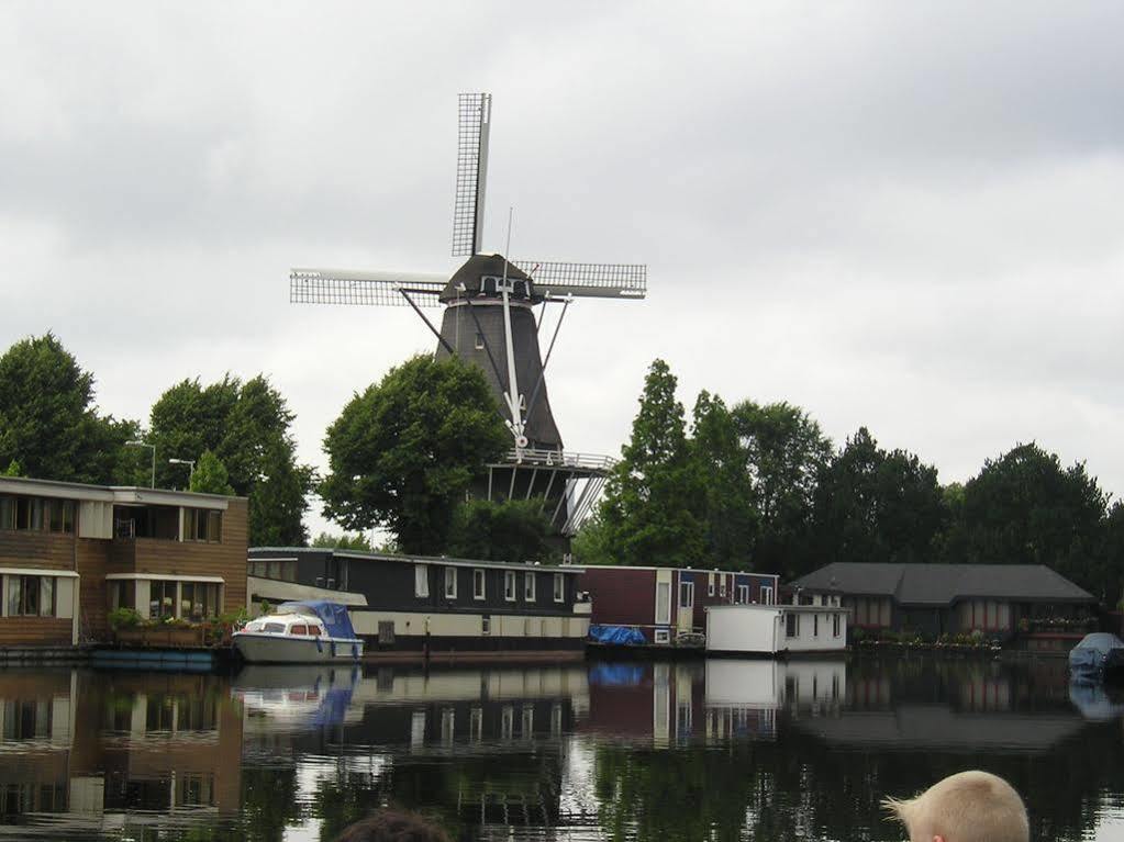 Houseboat Under The Mill Amsterdam Bagian luar foto